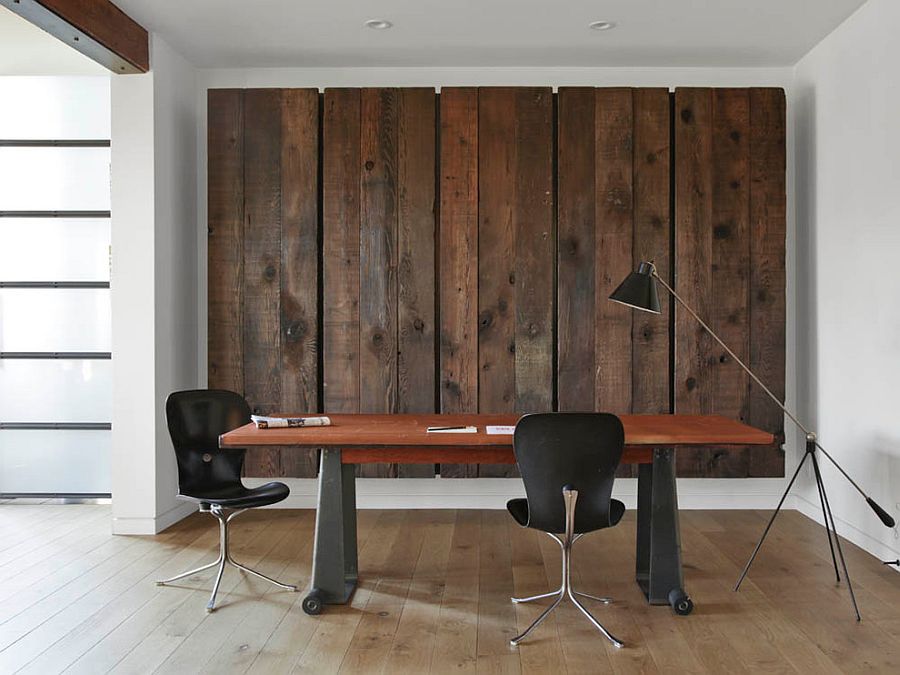 Wooden-panels-conceal-a-large-Murphy-bed-behind-them-in-this-contemporary-home-office